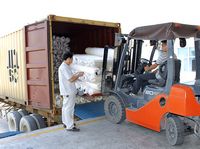 Loading goods and preparing to ship overseas.